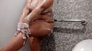 in the shower, i lather bubbly water over my big natural boobs as a sexy filipina bbw