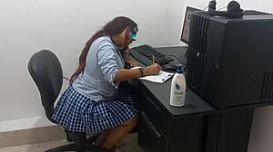 18-Year-Old Student Studies Computer Classes In Light Clothes Due To Heat