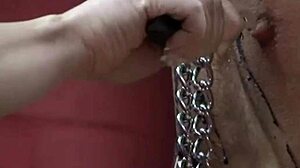German toilet scene with nipple clamps and wax torture ending in pissing