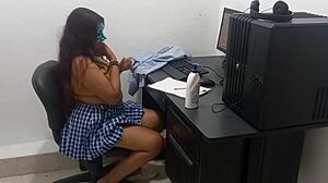 18-Year-Old Student Studies Computer Classes In Light Clothes Due To Heat