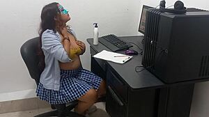 18-Year-Old Student Studies Computer Classes In Light Clothes Due To Heat