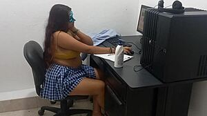 18-Year-Old Student Studies Computer Classes In Light Clothes Due To Heat