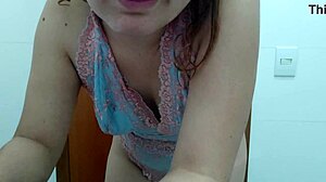 Brazilian woman preps big ass and tits for live show