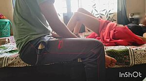 Desi bhabhi in red saree chats with servant about cleaning tasks near her wet laundry area