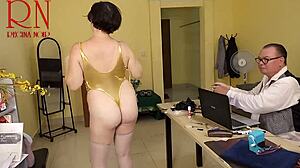 regina noir practices yoga in the office during scene two