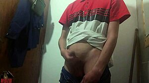 Skinny guy masturbates big cock in work bathroom with huge cumshot