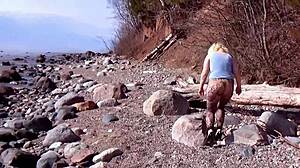 Fishnet pantyhose on big ass blonde babe in forest with natural tits and fetish legs exposed