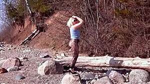 Fishnet pantyhose on big ass blonde babe in forest with natural tits and fetish legs exposed