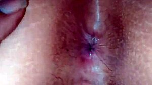 on all fours showing off her rich buttocks vagina and anus in sensual display