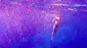 Hey, check this underwater sex with a hot milf riding that monster cock deep... she's loving every wet thrust! 💦👙