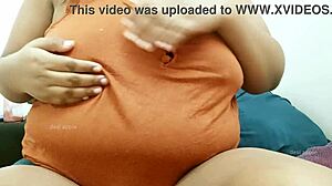 suggestive tamil aunty showing off her big boobs