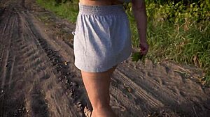 Flashing ass under miniskirt in outdoor upskirt tease with panties