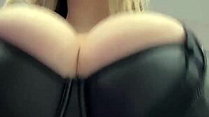 Big natural tits burst from elastic leather