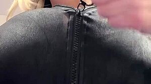 Big natural tits burst from elastic leather