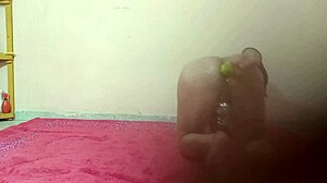 Cucumber inside ass, she says while stretching gaping hole as ladyboy in anal play.