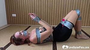 Amateur Submissive In Bondage Gets Bound And Humiliated With Homemade Vibrator Tape. She Moans In Domination During Natural Tits Play.