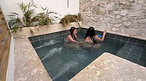 Two hot latinas masturbate in public pool with petite fingering and wet pussy action fearing discovery