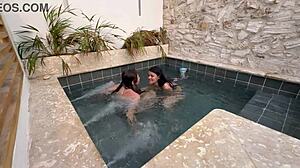 Two hot latinas masturbate in public pool with petite fingering and wet pussy action fearing discovery