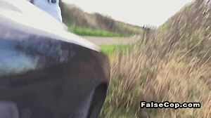 Tattooed babe gives blowjob and fucks in police car publicly