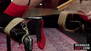 Submissive tattooed slut in bondage endures rough pussy whipping and maledom discipline with femdom elements