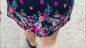 following mature milf in street with skirt and thong for big ass view