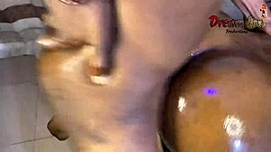 Pounding big black cock in oiled ebony ass doggystyle