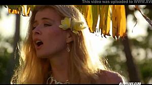 dialogic: manuia taie shows off her small tits and gives a handjob with banana in this retro celebrity nude scene