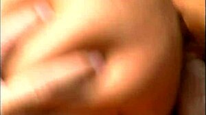 a mature man fucks an exotic babe wearing only a cap and sunglasses on the seaside stones