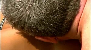 a mature man fucks an exotic babe wearing only a cap and sunglasses on the seaside stones