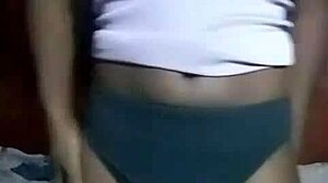 Hey, watch this horny Kenyan crossdresser strip and finger his gaping asshole solo.