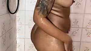 Hidden camera catches brunette latina peeing and masturbating with cum focus