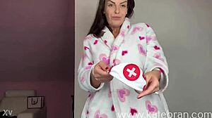 Batwoman costume try-on for Halloween, showing off my big tits in this femdom pov