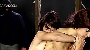 Girls get whipped and positioned above burning candles for punishment.