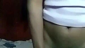 Hey, watch this horny Kenyan crossdresser strip and finger his gaping asshole solo.