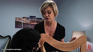 Goth teen 18+ straps on to dominate and anal fist busty professor in kinky bondage. Lezdom session turns rough with gaping rimjob action.