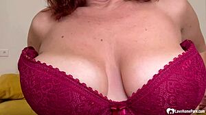 Mature Redhead Babe Masturbates With Dildo On Sofa In Lingerie