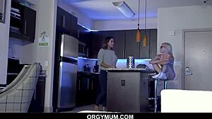 This hot cougar mommy blows her stepson in a steamy threesome while stepsis watches the action.