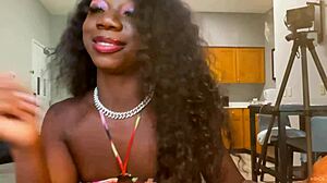 oh man lola black is so sexy licking that lollipop live with her pierced nipples