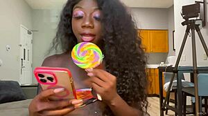 oh man lola black is so sexy licking that lollipop live with her pierced nipples