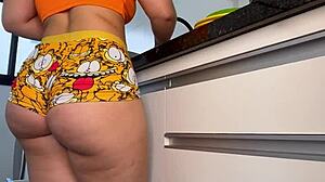 I love showing off my big ass as a housewife. Making dinner in tight shorts feels so good.