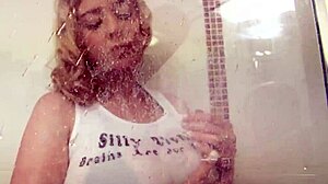 PureFilmsTV - Busty Blonde Sapphire Contrasts Dry Tease With Wet Shower Strip And Shaved Pussy Display.