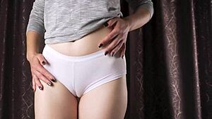 Intense close up tease of white panty cameltoe on tight teen pussy lips