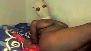 Hey, check out this sexy ebony babe dancing totally naked with tattoos