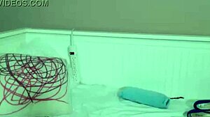 Busty oriental Maxine X in solo dildo fucking with big tits and wet pussy on bed