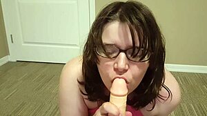Canadian amateur with glasses rides cowgirl on oiled dildo in intense anal toy session.