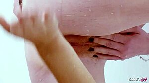 Tanned milf with saggy natural tits and bushy vagina seduces blonde pale skin teen under shower. Intense lesbian sex follows with kissing muff diving and rough quickie action.