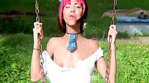Slutty school girl flashing on the swingset barefoot