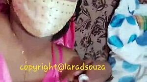 Indian Crossdresser Model Lara Dsouza Posing In Pink Satin Nighty