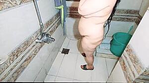 Can you believe this muslim bbw wife got caught naked in bath showing big ass boobs pussy