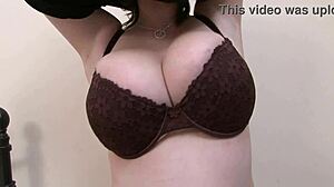 Curvy busty brunette woman in stockings teases with striptease showing big natural tits and fat ass.